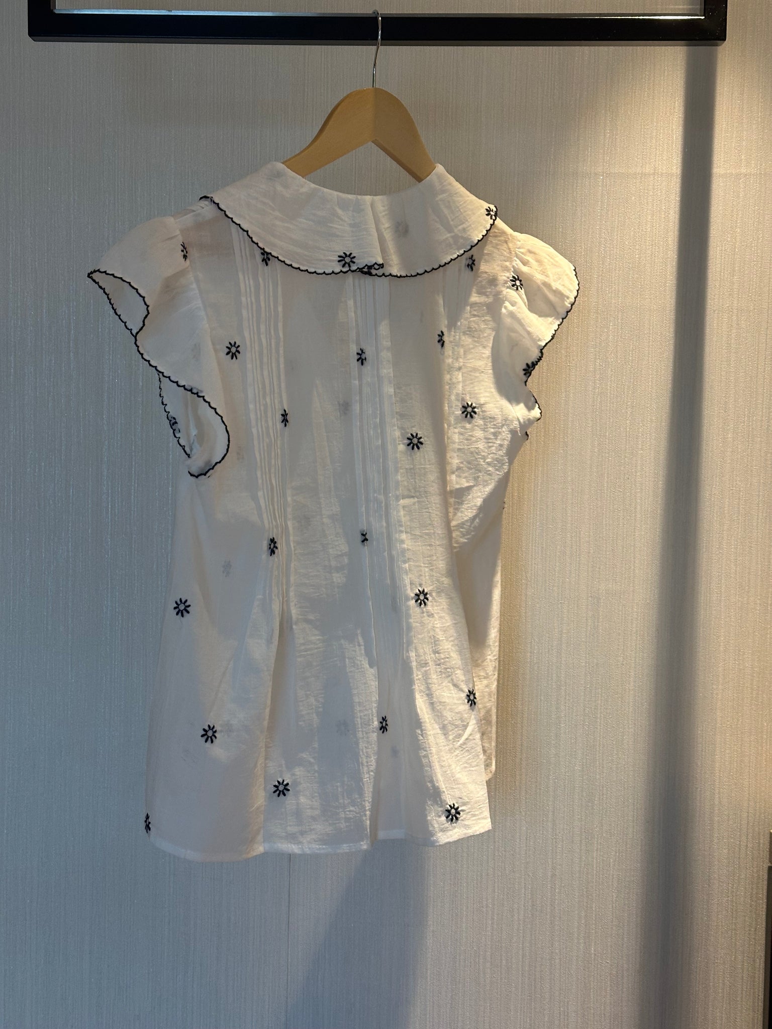 Embroidered Ruffle Vest