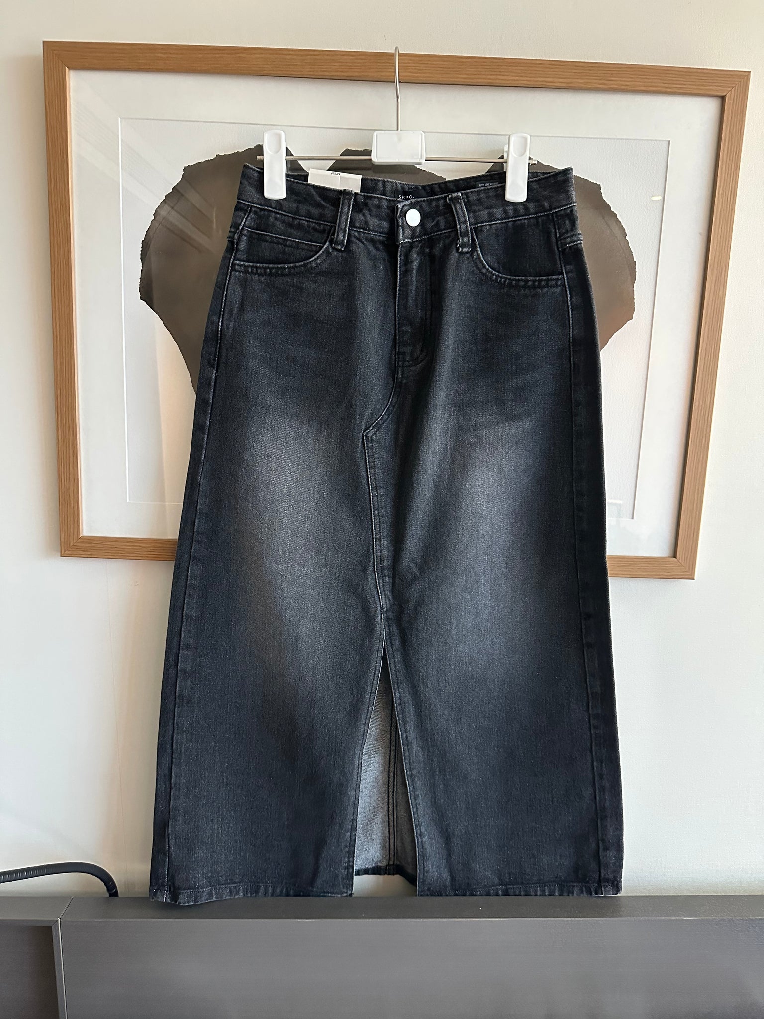 Black denim skirt