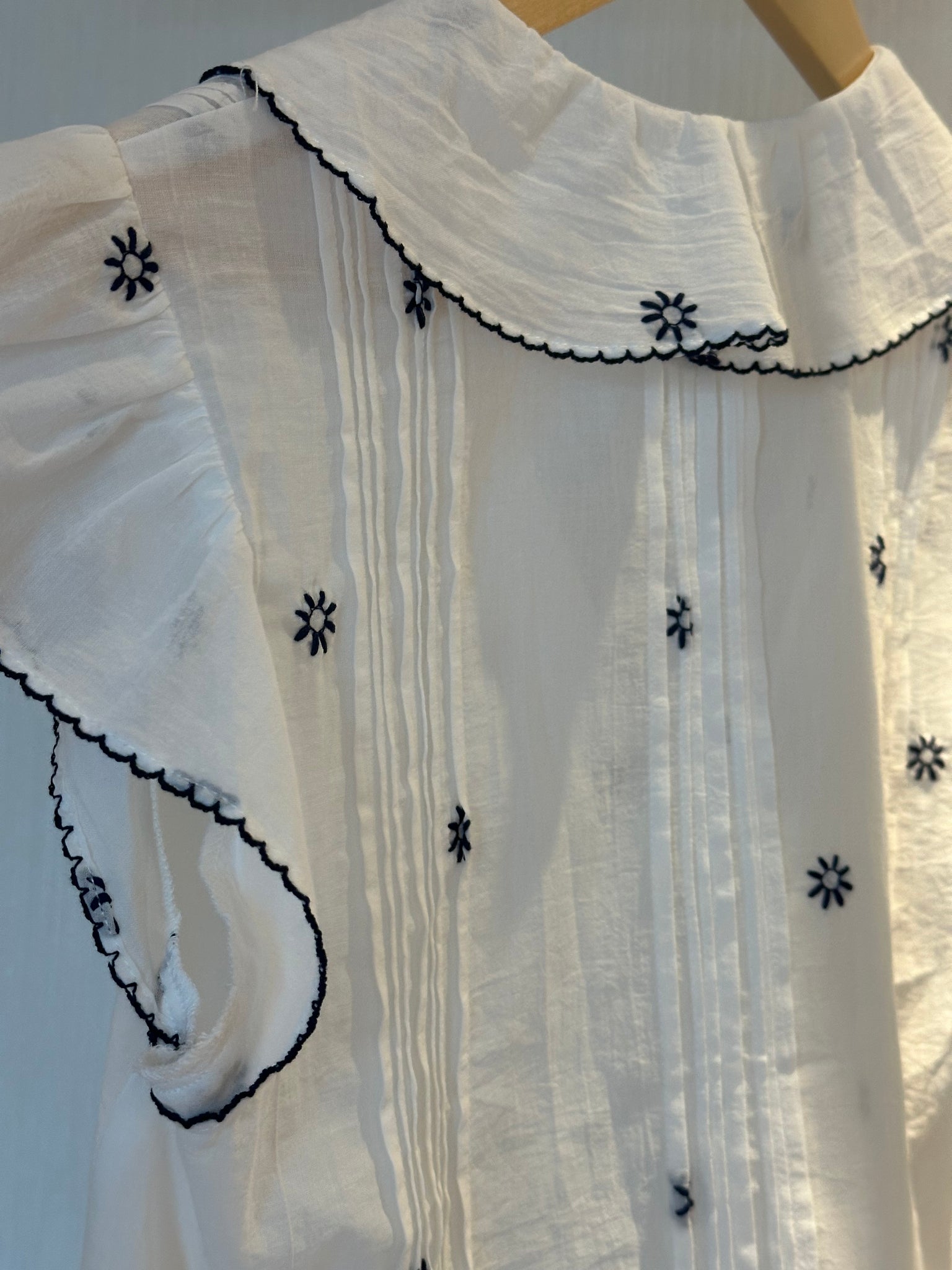 Embroidered Ruffle Vest